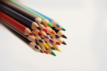 color pencils on a white background
