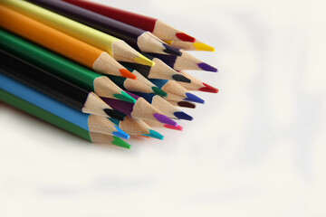 colored pencils on white background