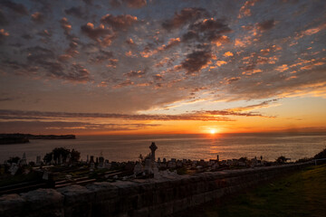 Sunrise and clouds by the coastline