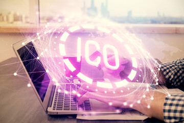 Double exposure of man hands holding a credit card and crypto business theme drawing. Digital blockchain and E-commerce concept.