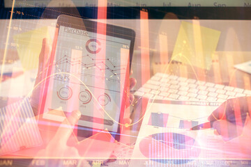 Multi exposure of man's hands holding and using a phone and financial chart drawing. Market analysis concept.