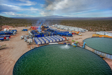 Vaca Muerta, Argentina, November 23, 2015: Extraction of unconventional oil. Water tanks for...