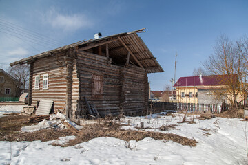 Traditional russian wooden house in spring village