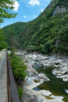 Hiking on a discontinued train-line along with Muko river in Hyogo prefecture in Japan