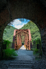 Discontinued railroad bridge as a part of hiking road, over Muko river in Hyogo prefecture, Japan