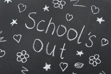 Words School's Out and pictures on blackboard. Summer holidays