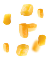 Sweet corn kernels falling on white background