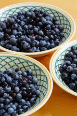 Bowls of fresh wild Maine blueberries