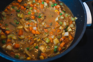 plant-based food, vegan stew with garden vegetables rice and cajun spices