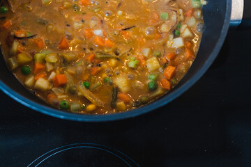 plant-based food, vegan stew with garden vegetables rice and cajun spices