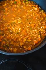 plant-based food, vegan stew with garden vegetables rice and cajun spices