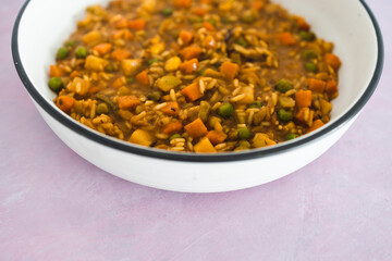 plant-based food, vegan stew with garden vegetables rice and cajun spices