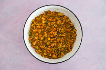 plant-based food, vegan stew with garden vegetables rice and cajun spices