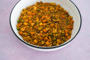 plant-based food, vegan stew with garden vegetables rice and cajun spices