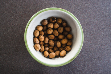simple food ingredients, bowl of walnuts on kitchen counter