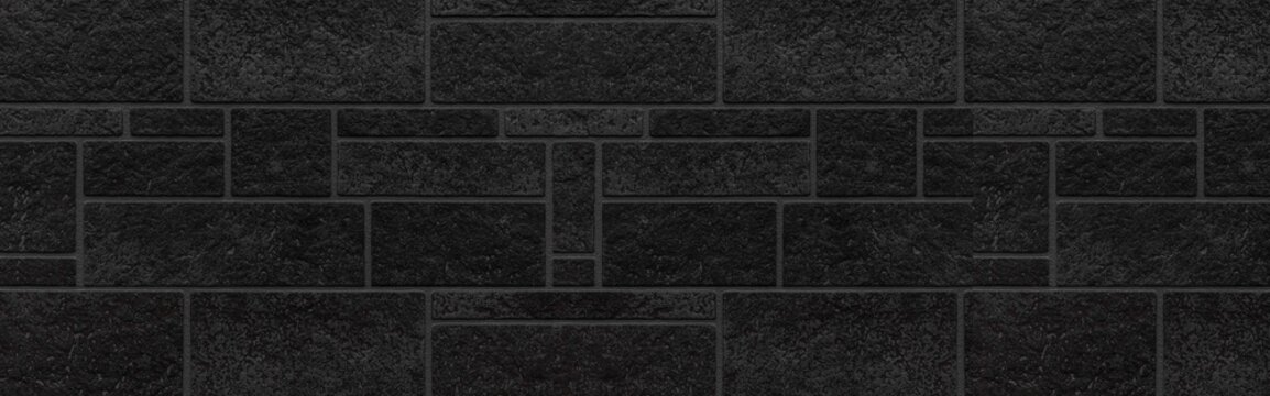 Panorama of Block pattern of black stone cladding wall tile texture and seamless background
