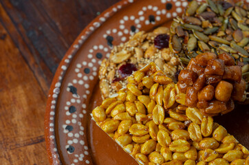 palanqueta de cacahuate pepita muégano barra de frutos secos dulce tradicional mexicano fruta con azúcar sabores deliciosos fiesta celebración familia colorido alegría postre apetitoso