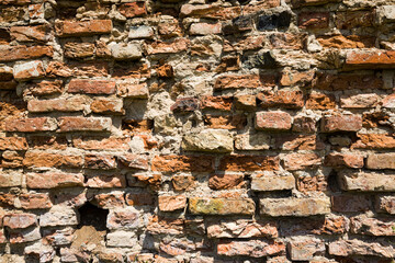 crumbling old brick wall