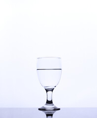 mineral water in a glass isolated white background