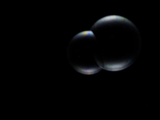 Soap bubble on black background