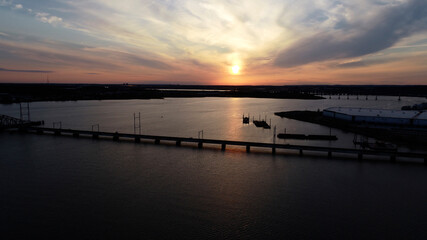 Aerial view of sun setting on Raritan Bay in Perth Amboy, NJ