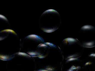 Soap bubble on black background