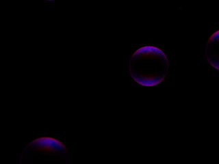 Soap bubble on black background