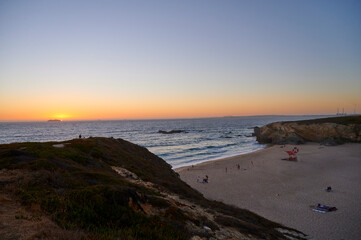 Ship passing in front of the setting sun