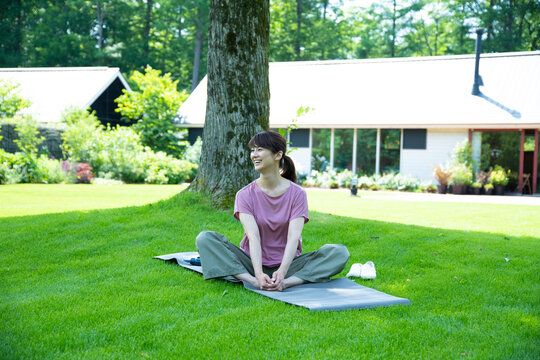 Woman Relaxing on the Lawn