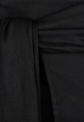 Part of black skirt close up