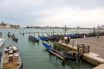 Jetty with gondolas on the Venice promenade