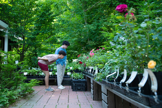 Young Men Shopping in the Garden Shop