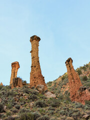 Strange and very tall, 75-100 feet, hoodoos in the Grand Staircase Escalante National Monument.