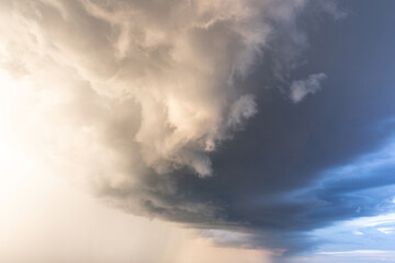 dramatic blue sky with clouds at sunset