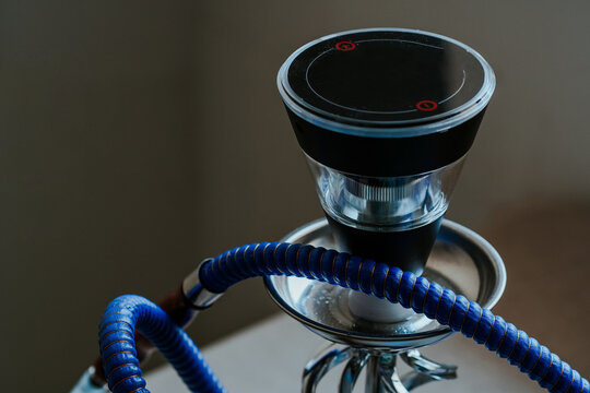 New generation electronic hookah or shisha. Modern hookah does not required charcoal can be charged and has internal battery.  