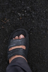 Foot of a man on the street