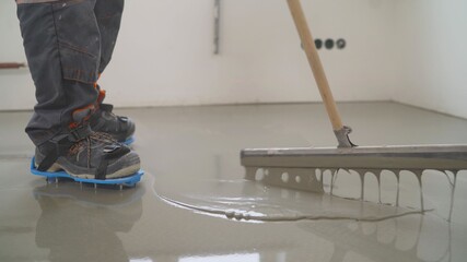 Interior of apartment under construction. Mirror smooth surface of the floor. Floor covering with...