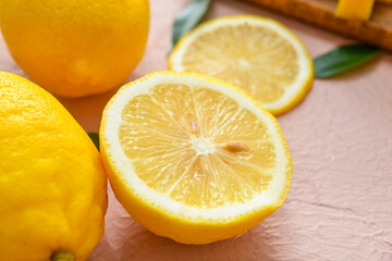 Ripe lemons on color background, closeup