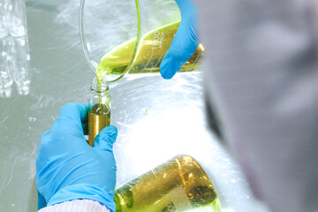Manual filling drug water at factory