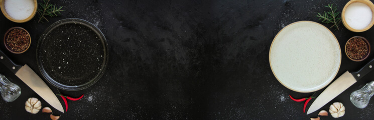 Empty plate on a dark metal background. Top view with copy space.
