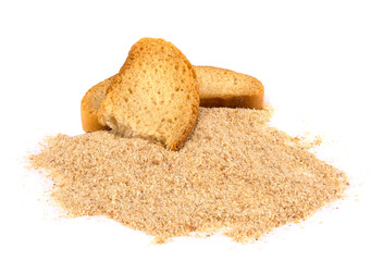Pieces of dried bread and breadcrumbs isolated on white