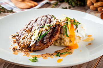 Gourmet grilled cutlet with mushroom sauce