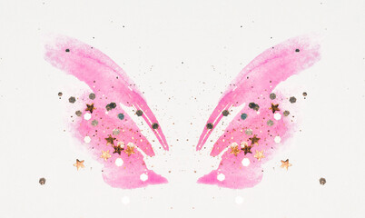 Golden glitter and glittering stars on abstract pink watercolor wings in vintage nostalgic colors.	