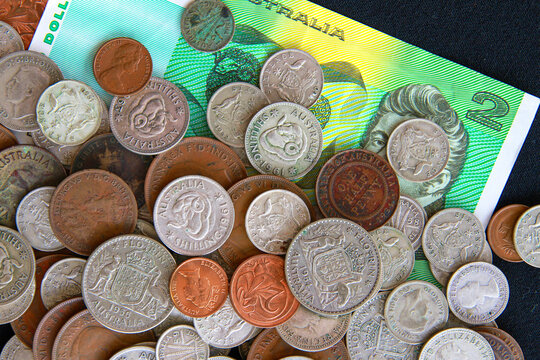 Old Australian money: coins and a two dollar note.