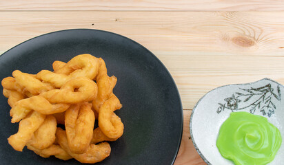 Pa Tong Go is Chinese fried dough and Pandan custard is the breakfast in ASEAN style.