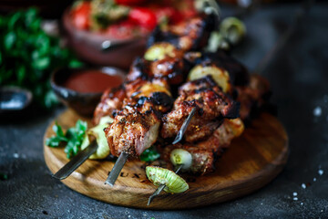 Pork Shashlik with grilled vegetables and sause
