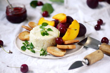 Farmer camembert cheese on the cutting board. selective focus