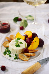 Farmer camembert cheese on the cutting board. selective focus