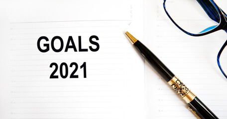 inscription 2021 goal. The concept of achieving business goals. Execution of a business plan. Purposefulness. Planning. Strategy and management