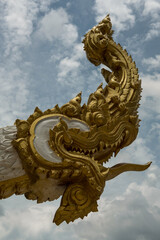 Fototapeta na wymiar golden great Naga statue in thailand